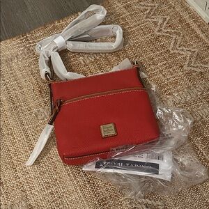 Pebble Grain Crossbody Letter Carrier in Red Dooney and Bourke